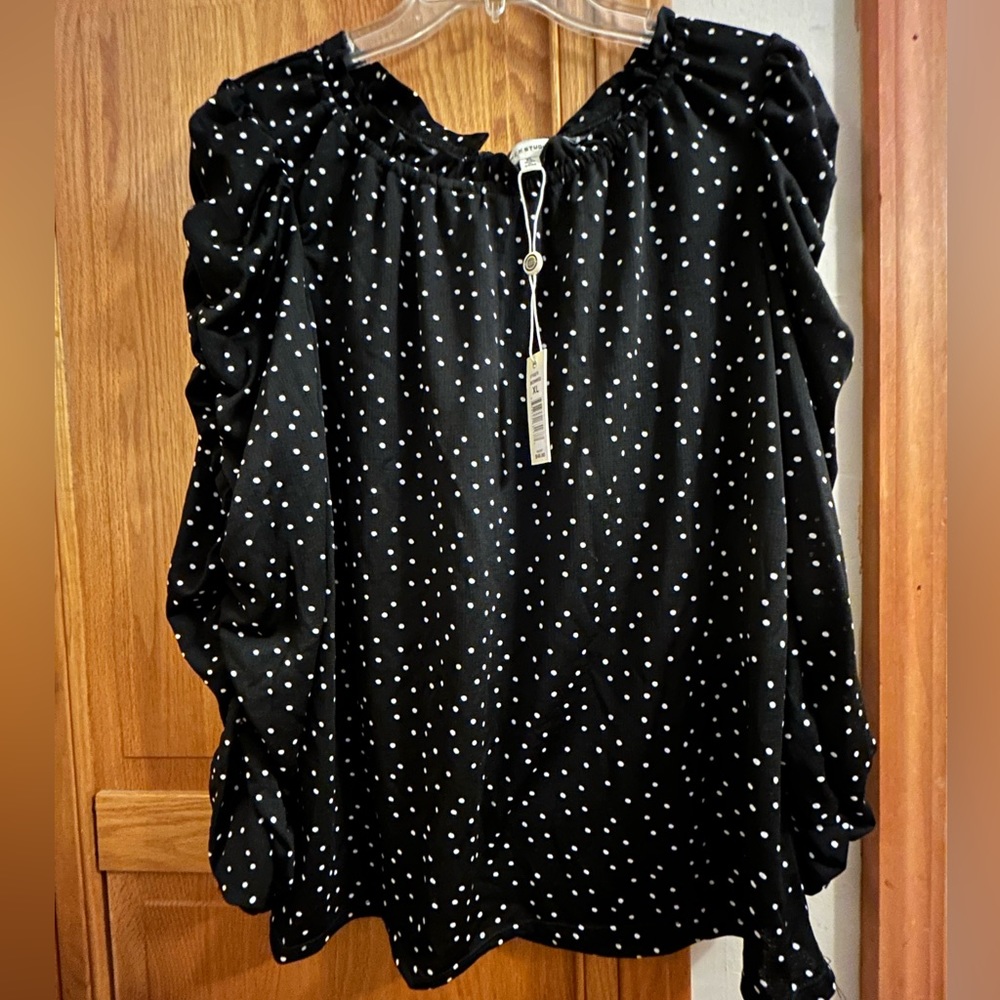 Black & white polka dot, ruched/bubble long sleeve blouse.
